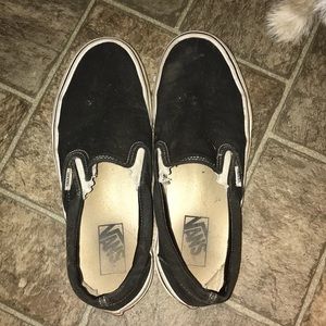 Black and white slip on vans